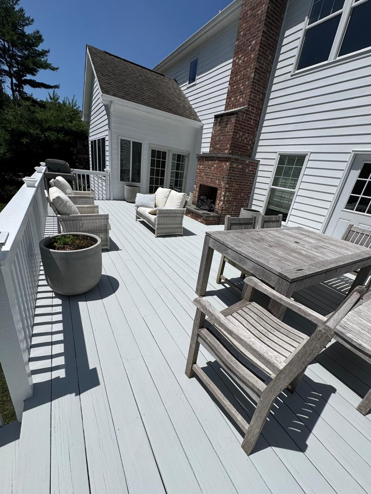 Finished painted deck and outdoor seating area